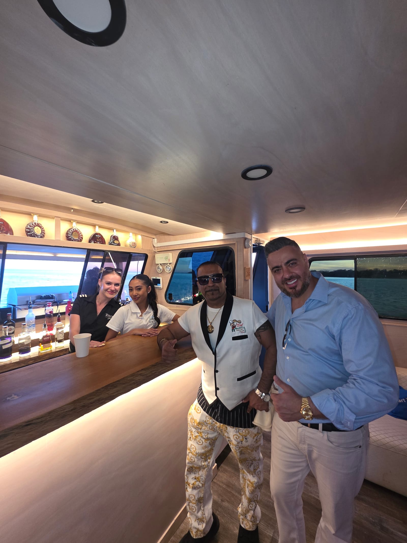 Live pizza service at the yacht bar during a sunset cruise