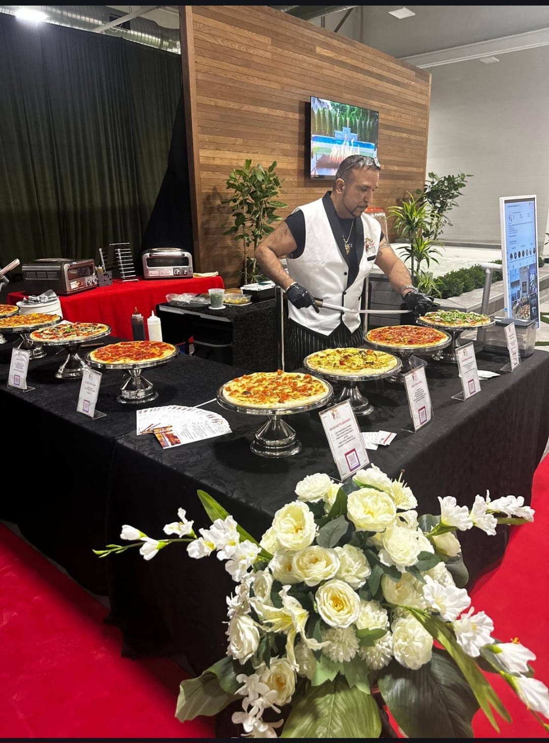 Nav serving from the live display at an engagement celebration