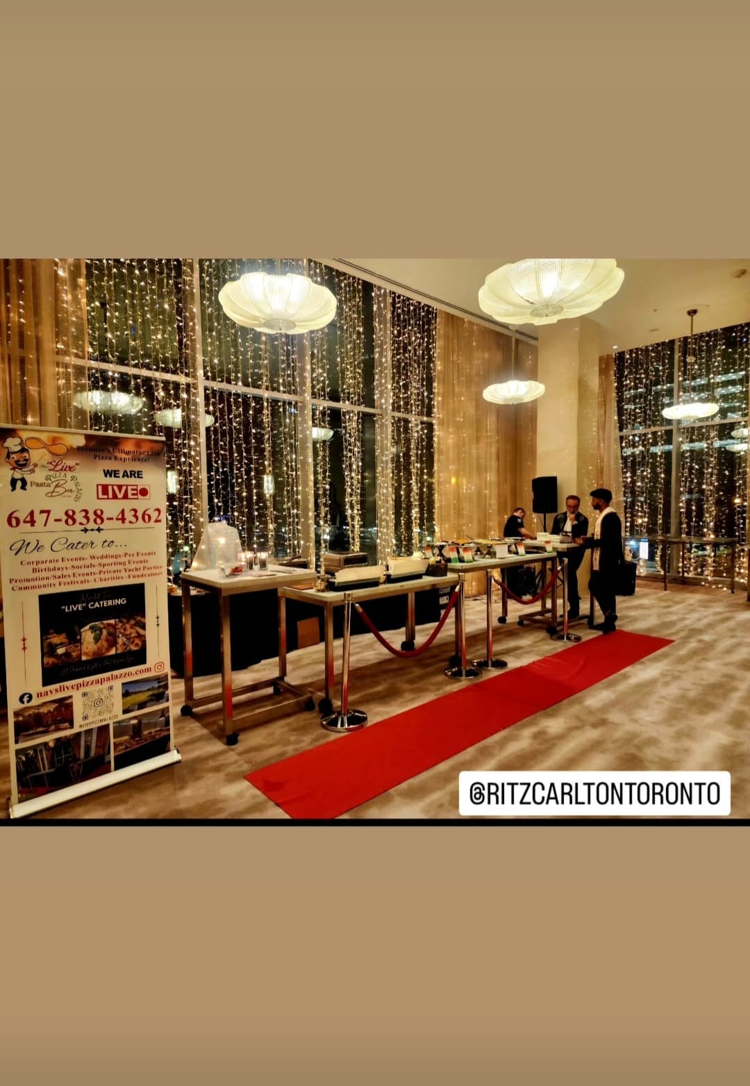 Red-carpet live pizza setup with fairy-light backdrop in the banquet hall of the Ritz-Carlton Toronto