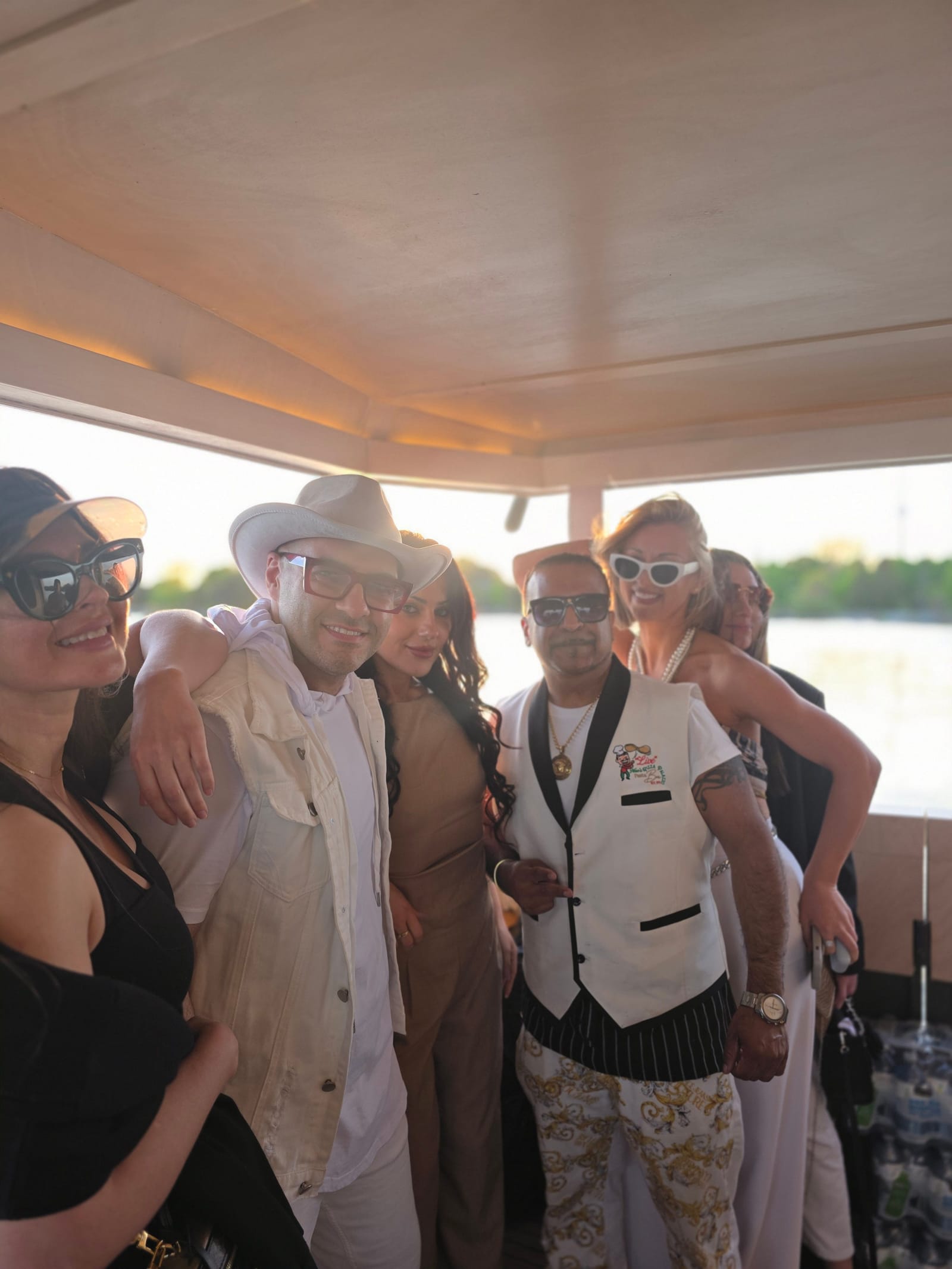 Live pizza station set up on a yacht deck cruising past the Toronto skyline